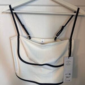 ALO Yoga Cream and Black Strappy Top